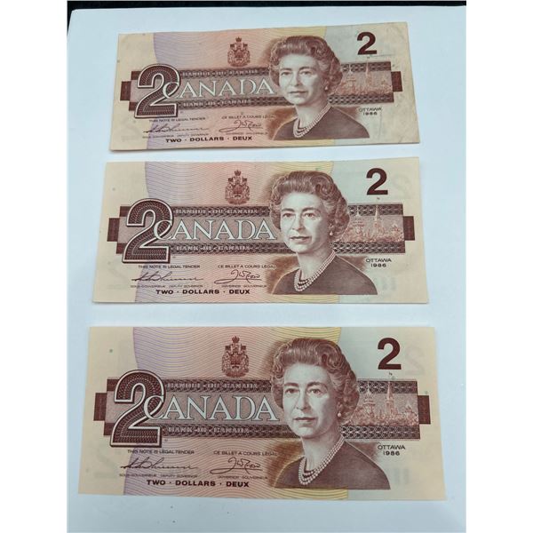 Three Canada $2 Bills 1986 Series Featuring Queen Elizabeth II and Robin Design