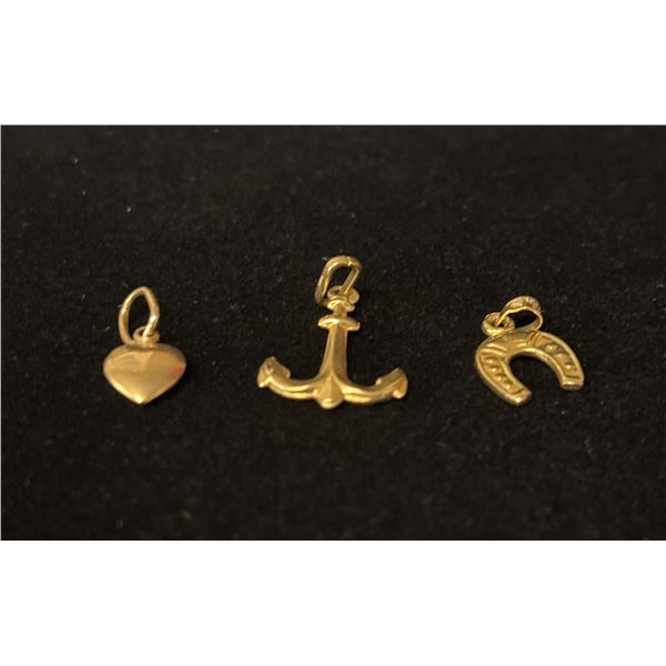THREE APPROX 14K CHARMS (1.7G)