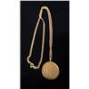 Image 1 : APPROX 18K CHAIN (28") WITH APPROX 18K PENDANT SET WITH 1986 SINGAPORE GOLD COIN (26.1G)
