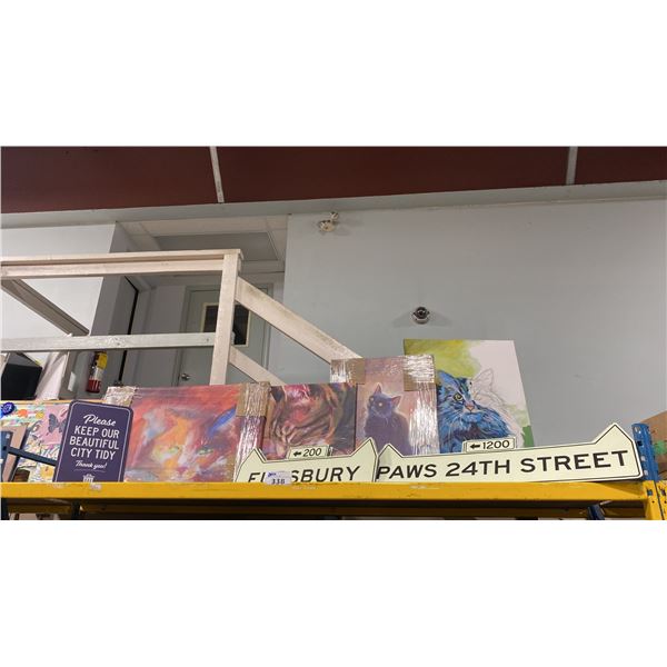 SHELF OF ASSORTED CAT ARTWORK & SIGNS