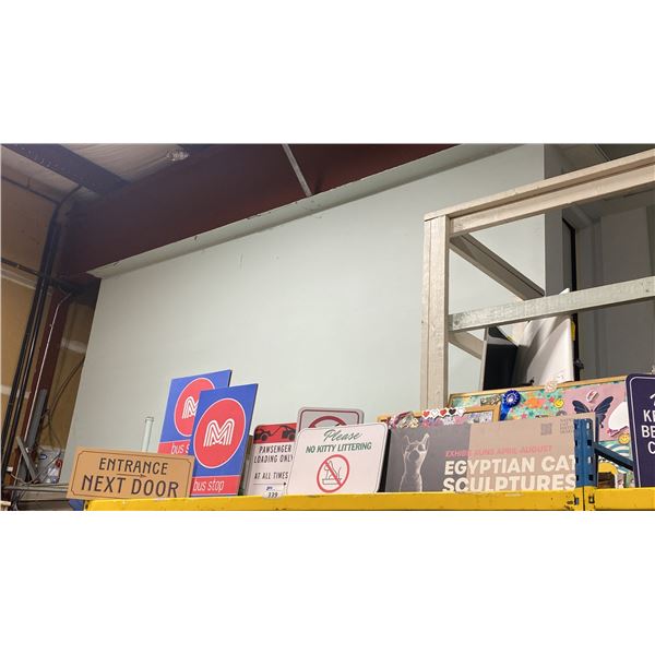 SHELF OF ASSORTED CAT ARTWORK & SIGNS