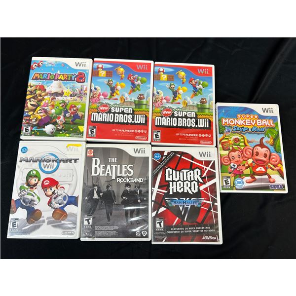 Lot of 7 Nintendo Wii Games Super Mario, Mario Party, Mario Kart, The Beatles, Guitar Hero, Etc