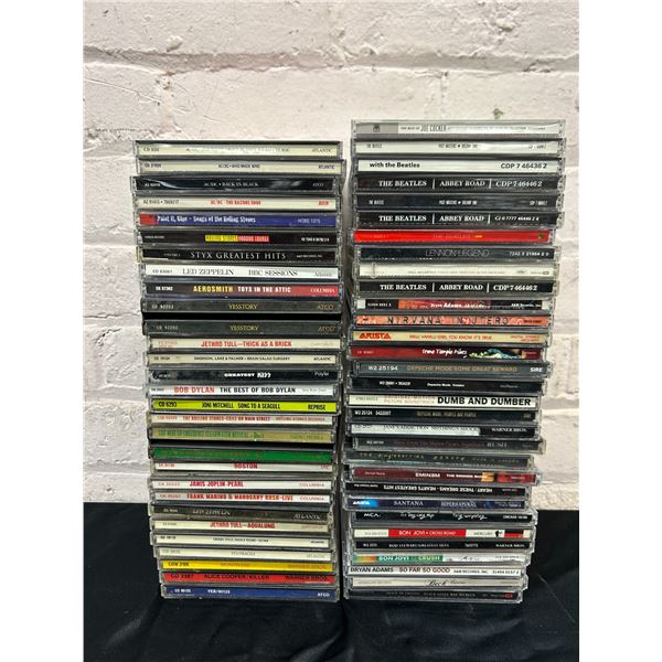 approx 60 CDs Assorted Rock, Aerosmith, Beatles, Nirvana, etc