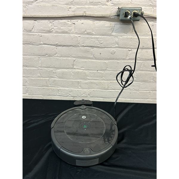 iRobot Roomba. Complete with charger