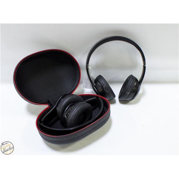 2 BEATS OVER EAR HEADPHONES PREVIOUSLY OWNED