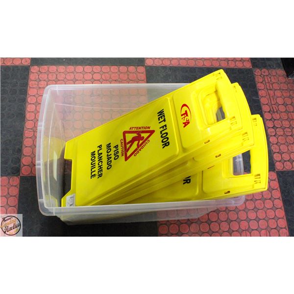 THREE TSA WET FLOOR SIGNS