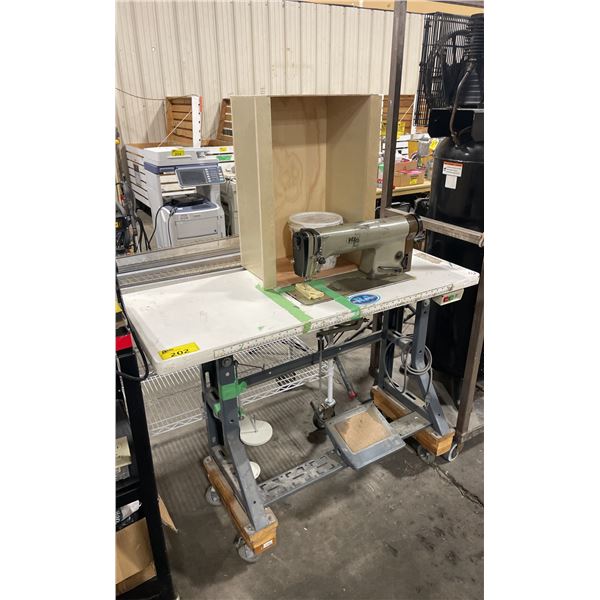 PFAFF COMMERCIAL FOOT OPERATED ELECTRIC SEWING MACHINE ON WHEELS WITH WOODEN COVER