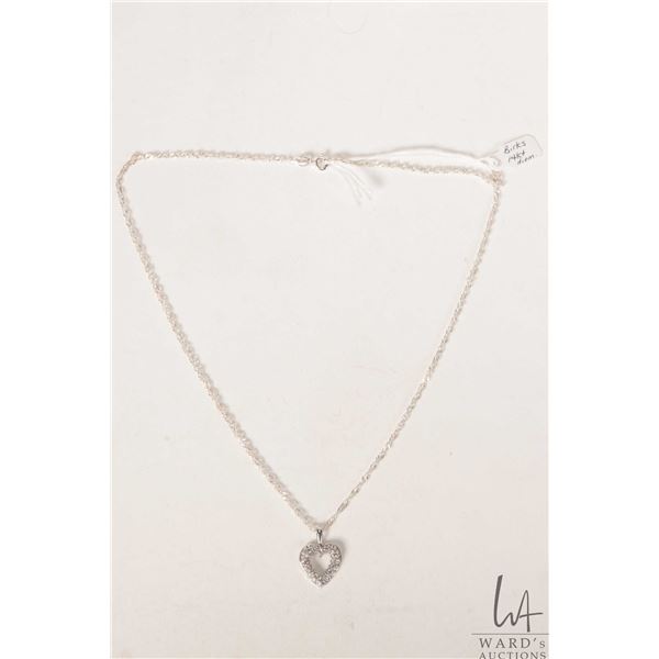 Birks 14kt white gold and diamond heart shaped pendant on 18" sterling silver twisted rope chair