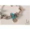 Image 3 : Genuine Pandora bracelet with eleven mostly sea themed Pandora charms including gold star fish and a