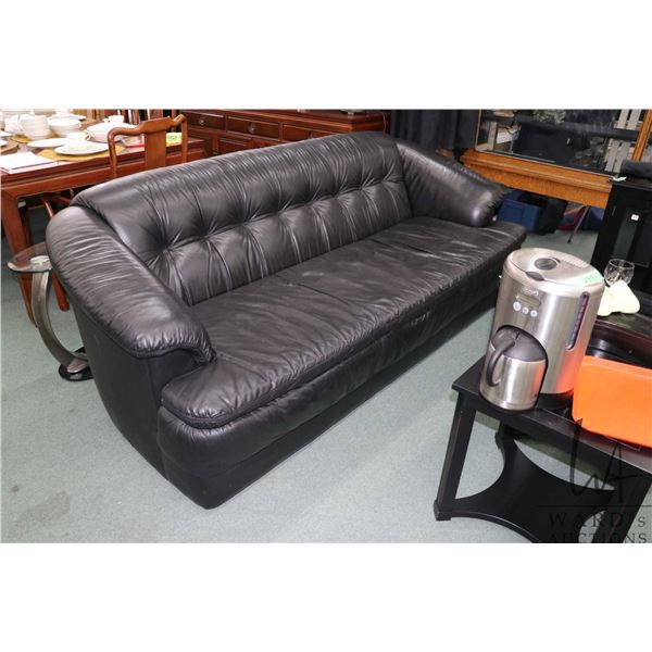 Black leather/ leather like full sized sofa 87" in length
