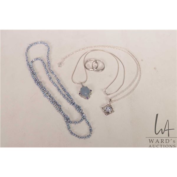 Selection of jewellery including sterling silver and blue pearl like stone pendant on 22" sterling s