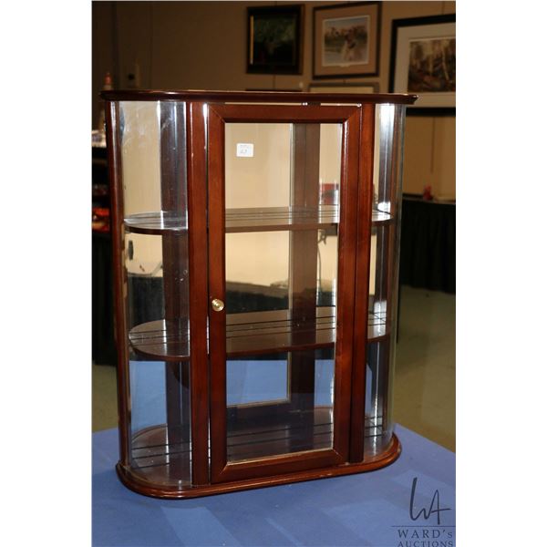 Bombay Company wall mount display cabinet with two shelves and curved glass side panels, 25" H X 20"