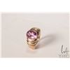 Image 1 : 10kt yellow gold ring set with oval cut possible pink topaz gemstone, size 7.5