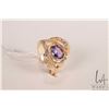 Image 1 : 14kt yellow gold ring set with oval amethyst gemstone, size 7.25