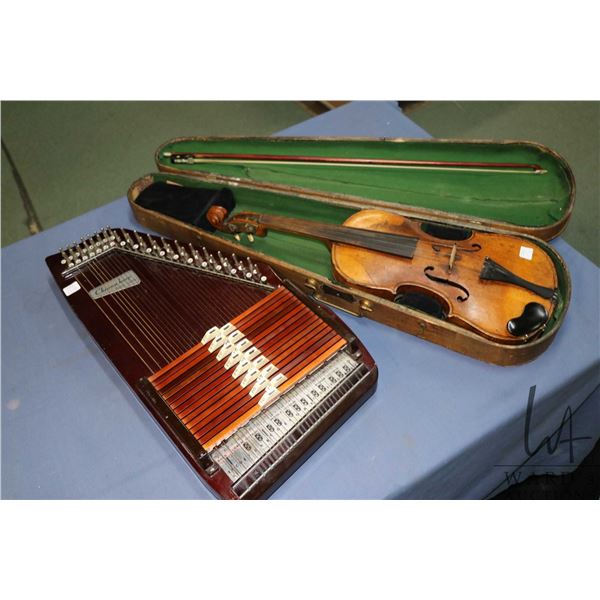 Chroma harp Tokai Gakki instrument and a violin in wooden case with bow