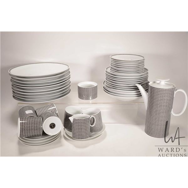 Selectin of Continental China German dinnerware including ten 10 1/2" plates, nine 7 1/2" plates and