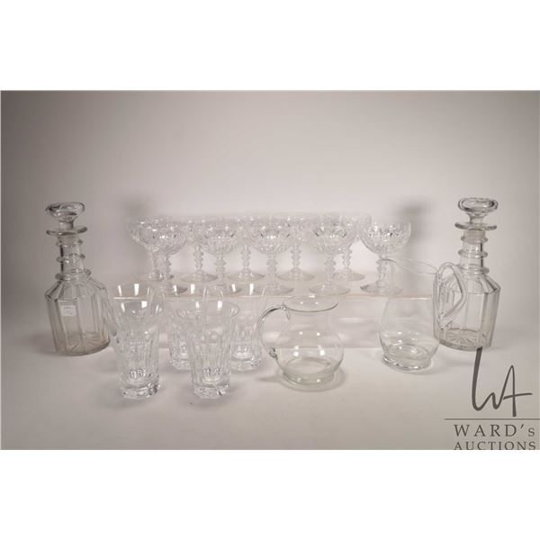 Selection of glass and crystal including ten crystal sherbet/ champagne, five tall water glasses, tw