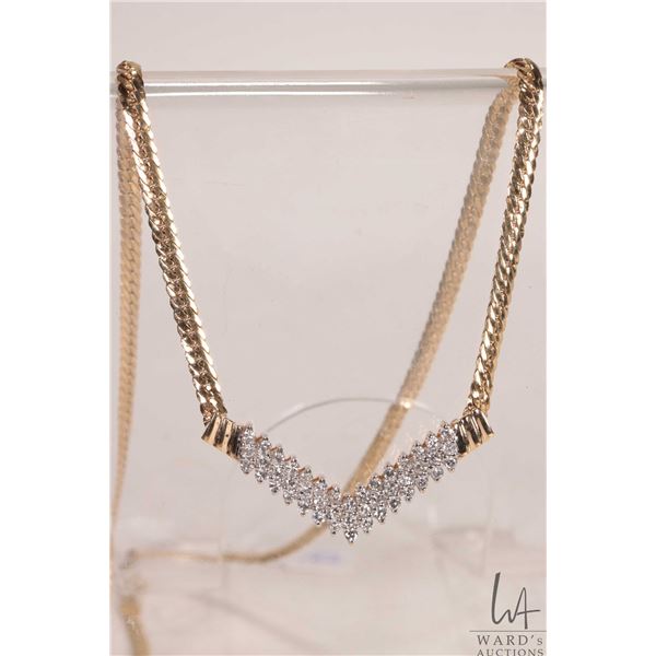 14ky yellow gold and diamond necklace, set with 1.00ct of round full cut diamonds. Retail replacemen