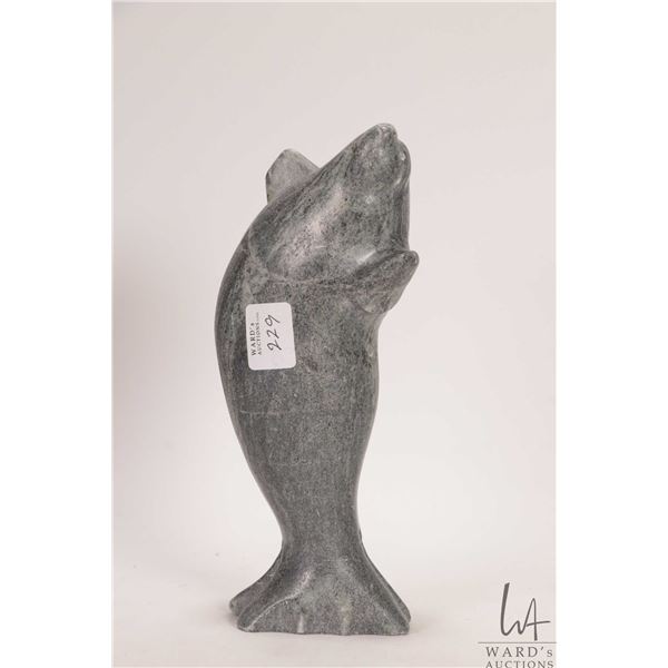 Hand carved Inuit soapstone of a breeching seal, numbered 10-34-27, no artist signature seen, 8" in 