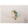 Image 1 : 14kt yellow gold five stone ring set with graduated oval cut emerald/ emerald like gemstones, size 7