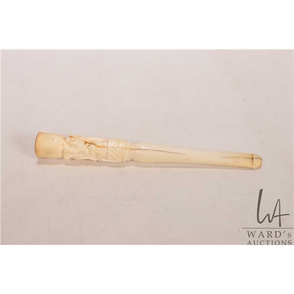Hand carved, elephant motif ivory cigarette holder 4" in length