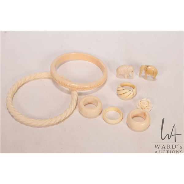Selection of hand carved ivory including Elephant ivory bracelet and rings, small animals and a rose