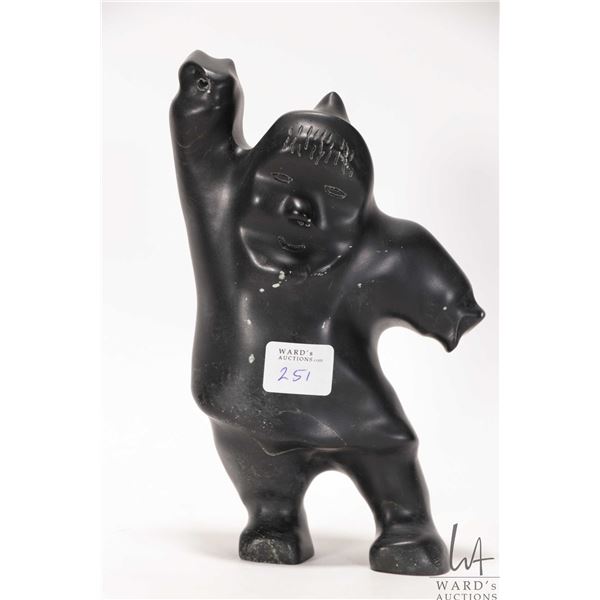 Totan, hand carved Inuit soapstone labeled "Hunter", 7 1/4" in height