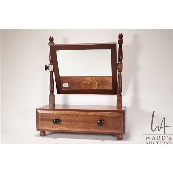 Antique mahogany dresser top vanity with swivel mirror and single drawer