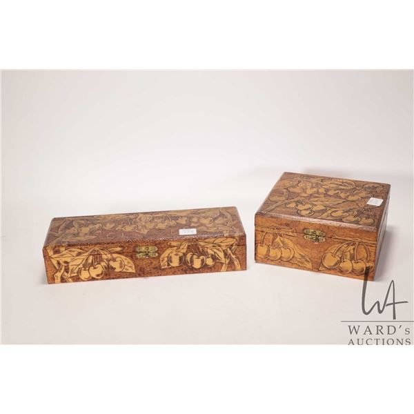 Two vintage hand made pyrography decorated boxes including 7" X 7" X 3 12" and a 11 1/2" X 4" X 2 1/
