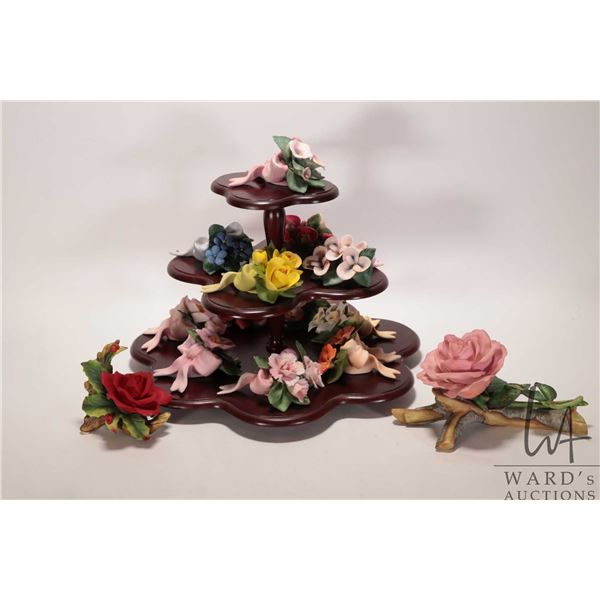 Selection of bisque flowers including set of twelve Tussie-Mussies with wooden display and a Queen E