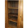 Image 3 : Large three door and three drawer European storage cabinet with carved raised panels, bun feet and m