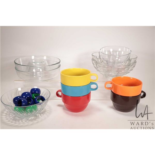 Selection of kitchenware including two vintage PYREX ring molds, two flower shaped clear bowls, crys