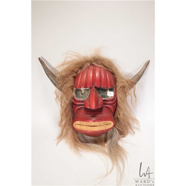 Artisan hand carved wooden, antler and hide mask, consignor purports made by artist in Southern Albe