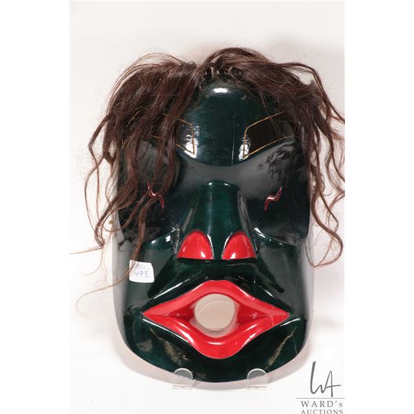 D. Silverquill, hand carved and hand painted Inuit mask with human hair, titled "Tzonoqua", consigno