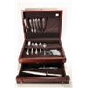 Image 1 : Wooden canteen containing a selection of Northumbria sterling silver flatware including seven dinner