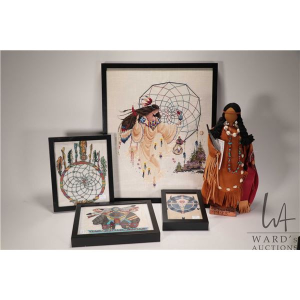 Four framed Indigenous needleworks and a artist made 16" doll