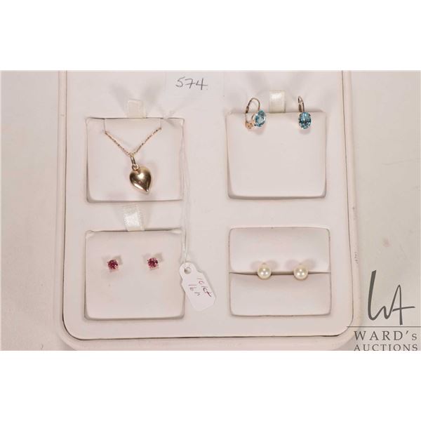 Selection of 10kt yellow gold jewellery including 16" neck chain with heart pendant, pink gemstone e