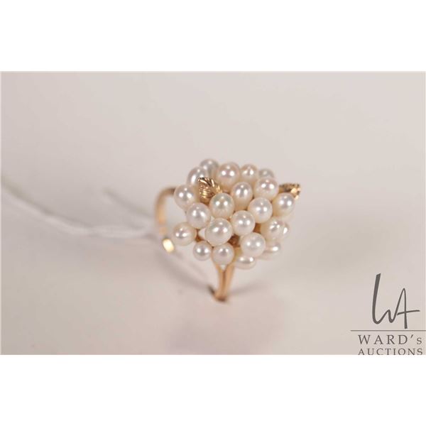 Tested 10kt yellow gold ring set with genuine pearls, size 9