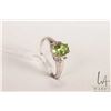 Image 1 : 10kt white gold, peridot and diamond gemstone ring, size 10. 25