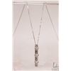 Image 1 : 18kt white gold neck chain with tested 18kt white gold and three diamond pendant, 18" in length