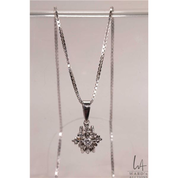 18kt white gold18" box chain with tested 18kt white gold and diamond set pendant