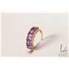 Image 1 : 10kt yellow gold five stone ring set with five square amethyst gemstones, size 5.5