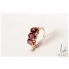 Image 1 : 10kt yellow gold and three stone garnet ring, size 7