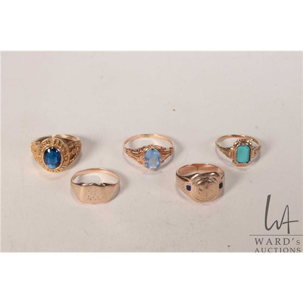 Five vintage 10kt gold rings including four sized 3 to size 4 and a size 6.25 set with blue gemstone