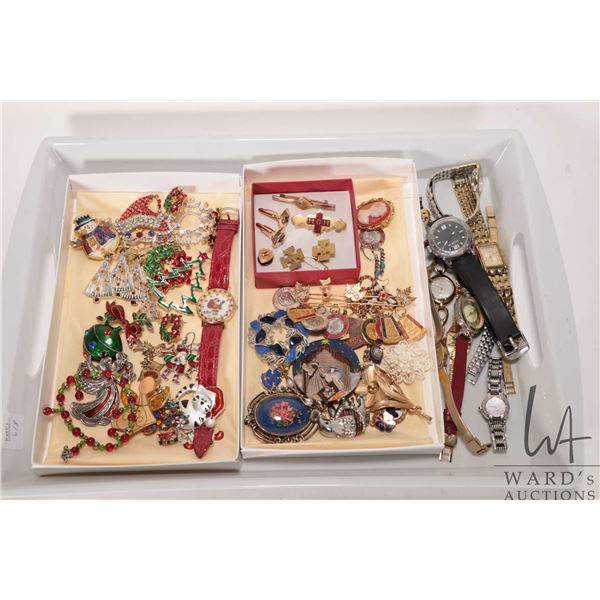 Tray lot of vintage and collectible costume jewellery including Christmas themed enamel brooches and
