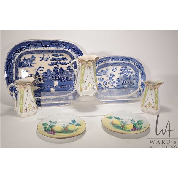 Two antique blue and white Willow patterned chargers including 16" X 19" and 14 3/4" X 11 1/2" plus 