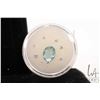 Image 1 : Loose citrine/ aqua blue oval cut gemstone and eight small gemstones that test as diamond