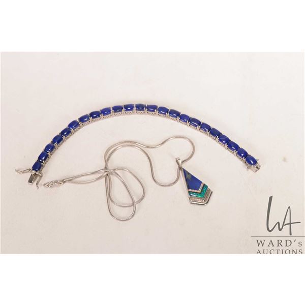 Sterlling silver and blue lapis stone 8" bracelet and a sterling silver lapis stone pendant on 18" n