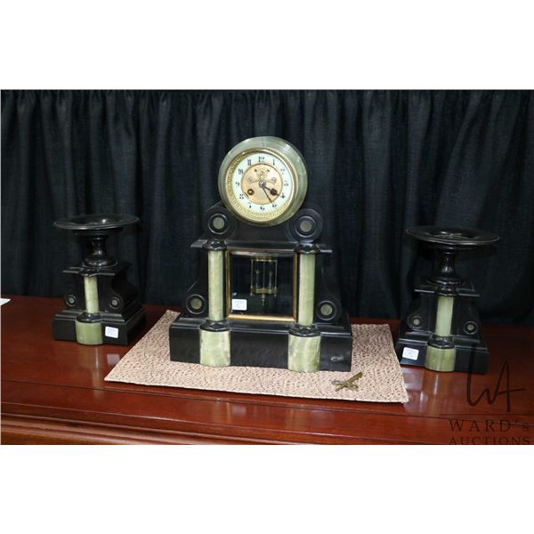 Antique French slate mantel clock with green marble columns, visible mercury pendulum, eight day bra