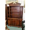 Image 1 : Diminuitive flame mahogany book cabinet with four doors, three drawer, pull writing surface and book